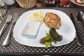 Sliced Ã¢â¬â¹Ã¢â¬â¹chicken cutlet, breaded in breadcrumbs from white bread with a side dish of mashed potatoes Royalty Free Stock Photo